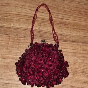 Ruby read beaded wristlet bag